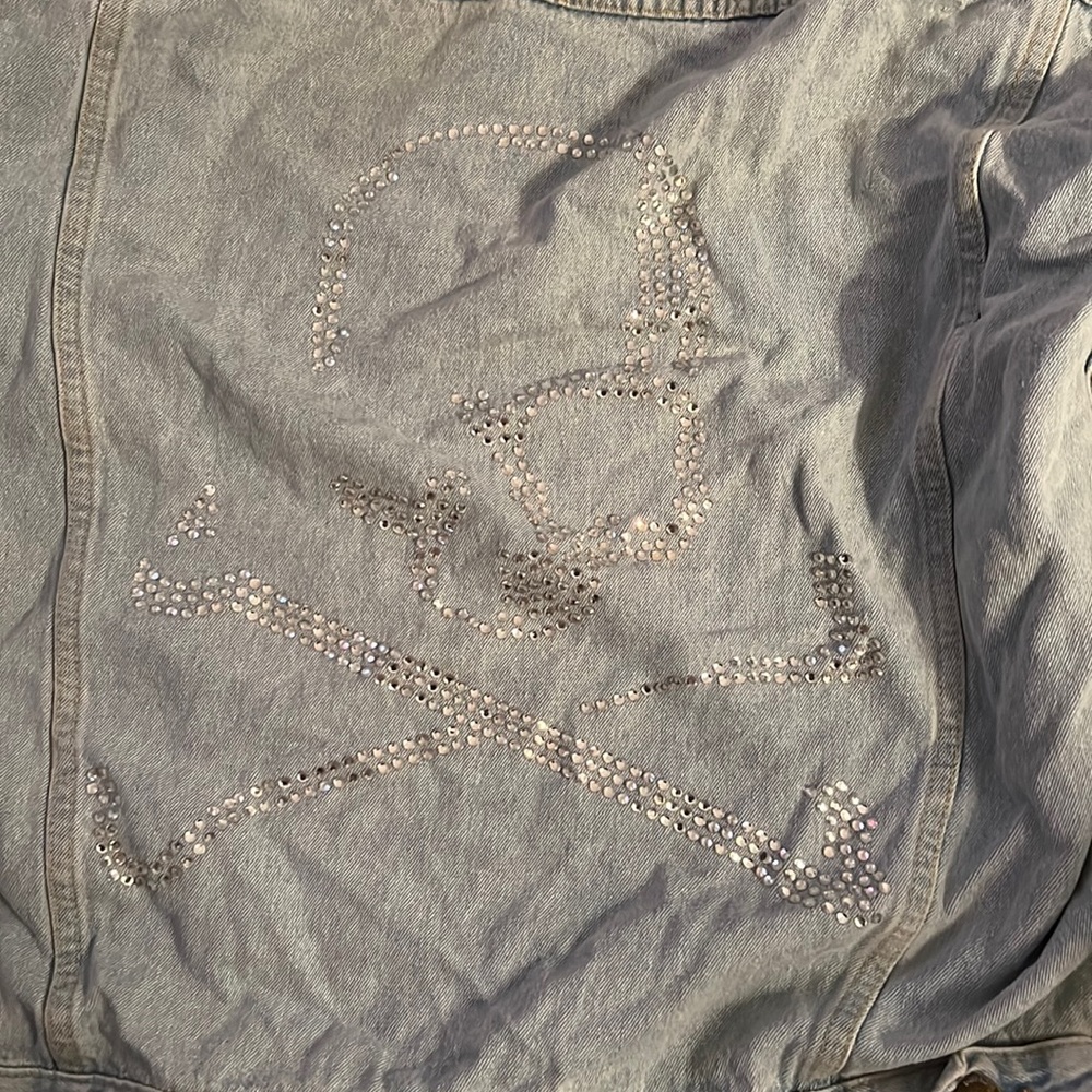 Oversized jean jacket with skull on back